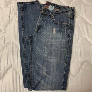 Levi’s distressed medium wash skinny jeans S28